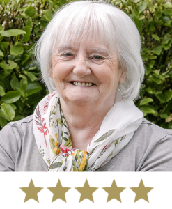 Hair Volume⢠3 Woman smiling with five stars displayed underneath.