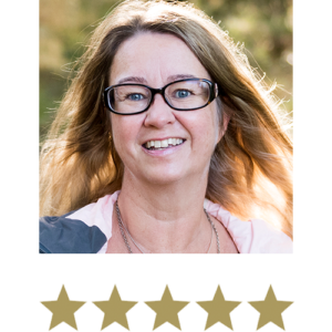 Fat Burner™ 2 Middle-Aged Woman wearing glasses smiling with five stars beneath