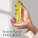 Hands holding a single yellow Collagen Shot™ sachet, displayed with text Beauty liquid collagen.
