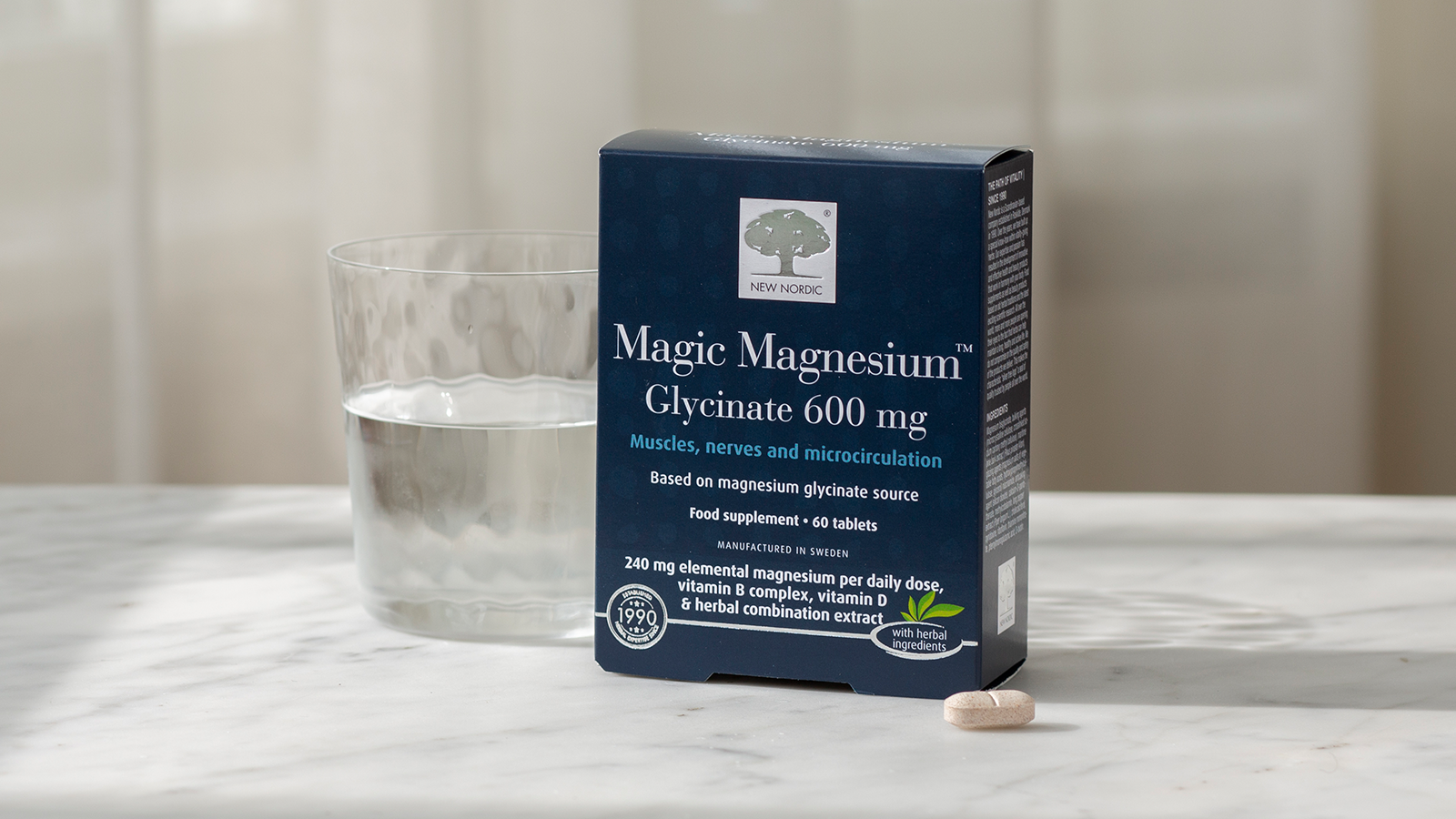 Quest for Optimal Brain Health includes Magnesium Glycinate 26 Magic Magnesium™ Glycinate with a glass of water and a tablet beside it on a light background.