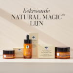Natural Magic™ skincare producten op lichte achtergrond met tekst bekroonde Natural Magic lijn.