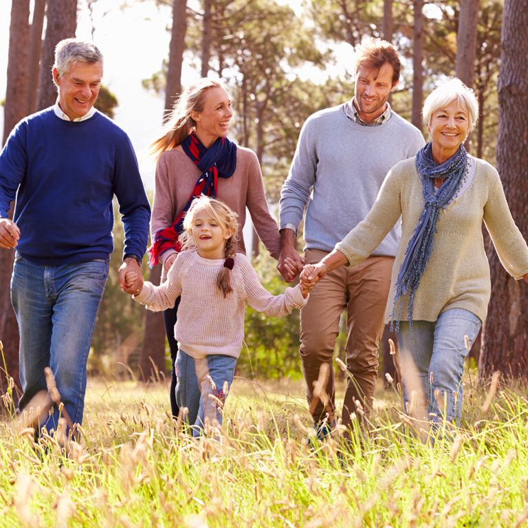 A happy and healthy family in forrest environment