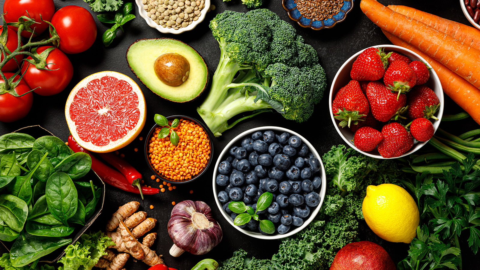 The Minds Behind The Magic 12 A colorful assortment of different fruits and vegetables.